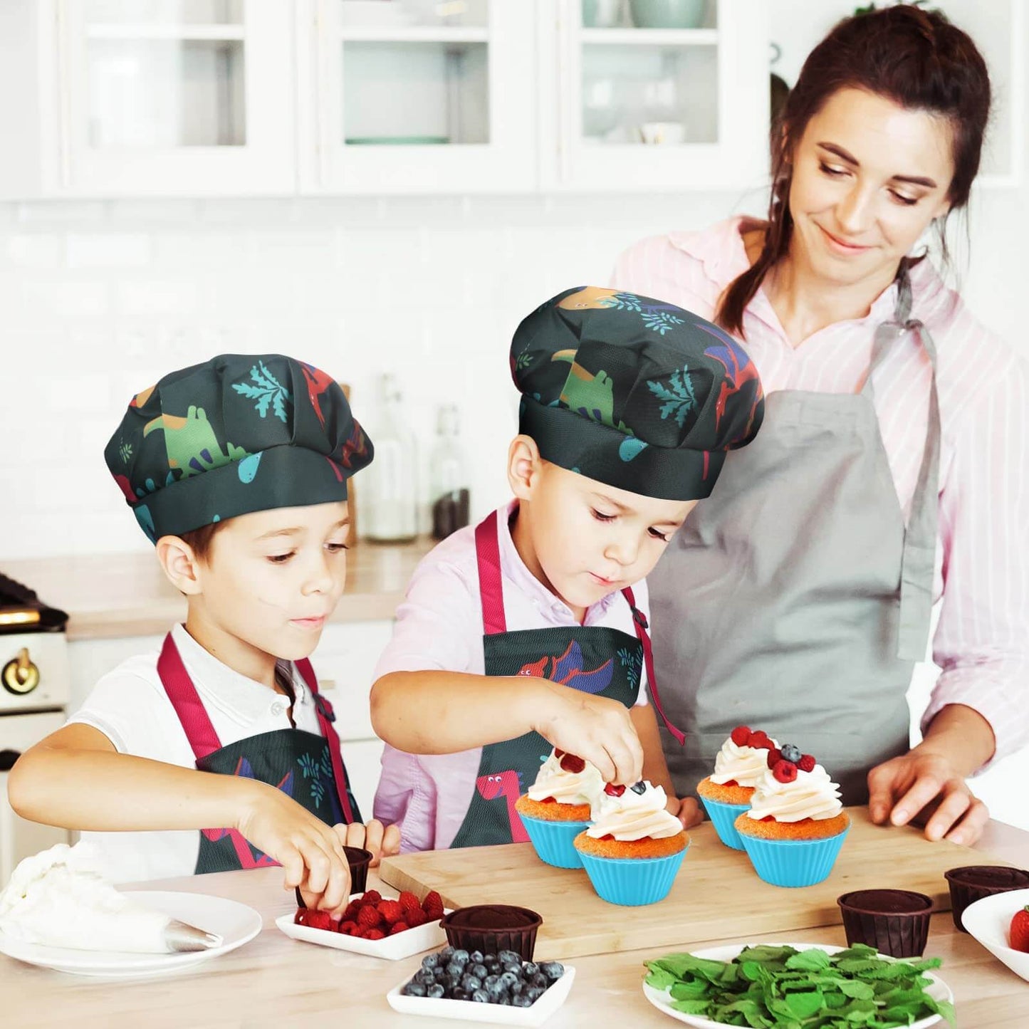 Kids in dinosaur cooking set with adult, promoting parent-child interaction during baking.