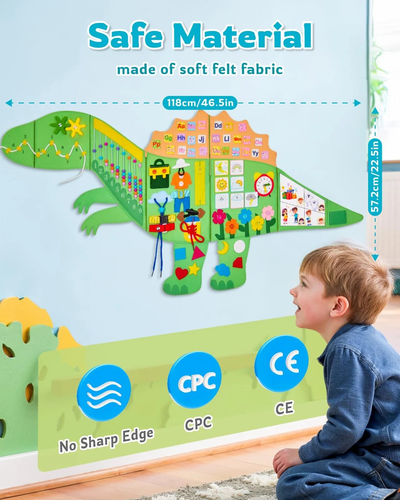 Child playing with a dinosaur busy board made of soft felt fabric.